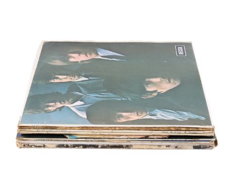 A collection of nine assorted Rolling Stones vinyl LP records from the 1960s. Including No. 2, Let It Bleed and Flowers, etc.