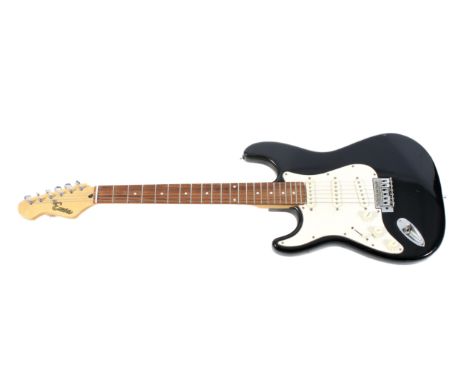 Encore left handed electric guitar in black and white. Comes with a Fender padded canvas backpack bag. 