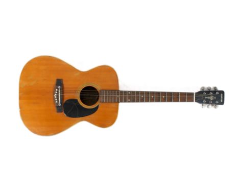 A vintage Japanese Kasuga F10 acoustic guitar. 