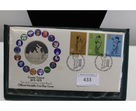 A first day cover commemorative silver coin 