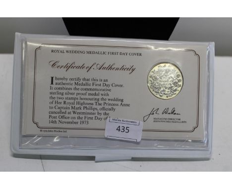 A first day cover commemorative silver coin 