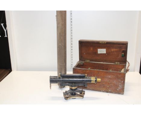 An Antique boxed Theodolite made by Davis of Leeds with stand. Postage unavailable 