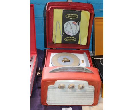 A vintage 1960s Dansette portable 7 inch single record player 