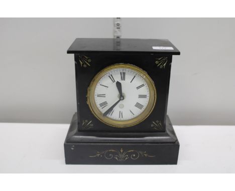 A slate mantle clock converted for battery use postage unavailble 