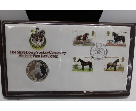 A first day cover commemorative silver coin 