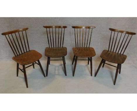 A set of four vintage stick back dining chairs. H.82cm 