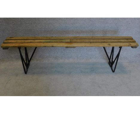 A fold down trestle end planked top bench. 52x180cm 