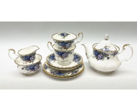 Royal Albert teaset for two, comprising teapot, two tea cups and two saucers, two side plates, milk jug, and open sucrier, de