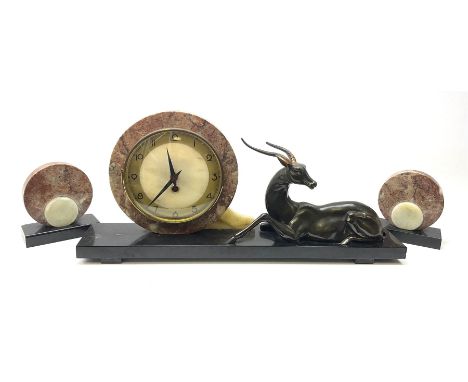 Art Deco style marble and anodised spelter three-piece clock garniture, model with recumbent gazelle, centre piece L52cm.  