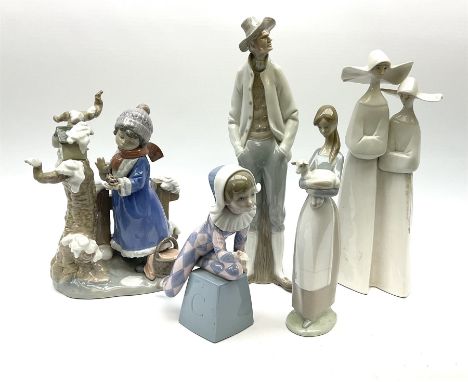 A group of five Lladro figures, to include Winter Frost model no 5287, H25.5cm, a Harlequin figure, girl with lamb, etc. 