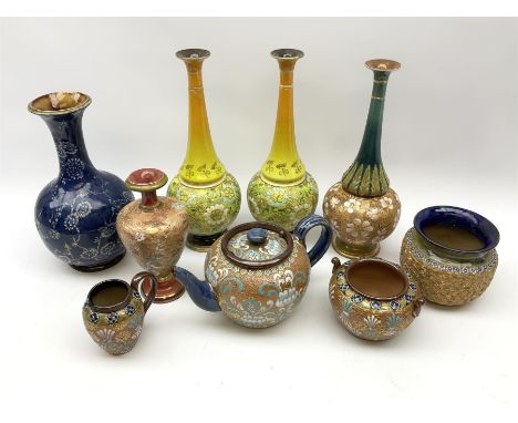 A group of Doulton Lambeth, to include a number of pieces marked Slaters Patent, comprising pair of vases of bottle form with