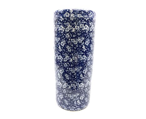 Ceramic stick stand with prunus blossom design in blue and white, H44cm.