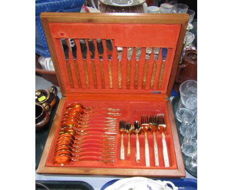 A Flexifit gold colour finish Continental Webber and Hill six piece canteen of cutlery, in fitted case. 