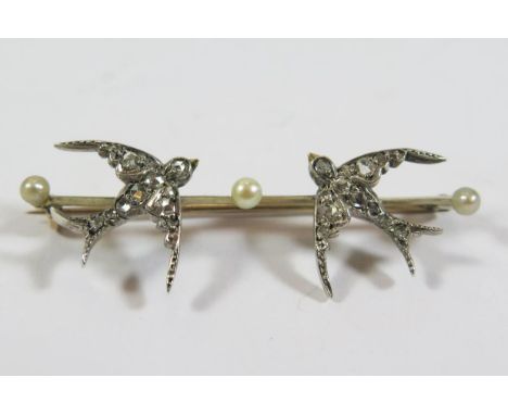 A Rose Cut Diamond and Pearl Lovebirds Brooch in an unmarked high carat gold setting, 51mm 