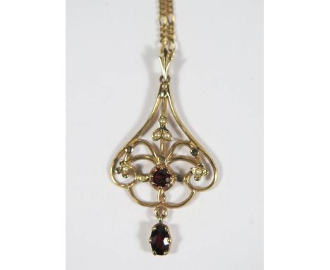 A 9ct Gold, Garnet and Seed Pearl Pendant on necklace, 5.1g 