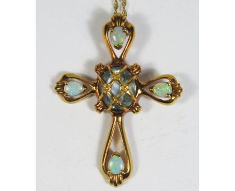 A 14ct Gold, White Opal and Aquamarine Cross Pendant (4cm long) 5.8g and on 14ct gold chain 1.7g 