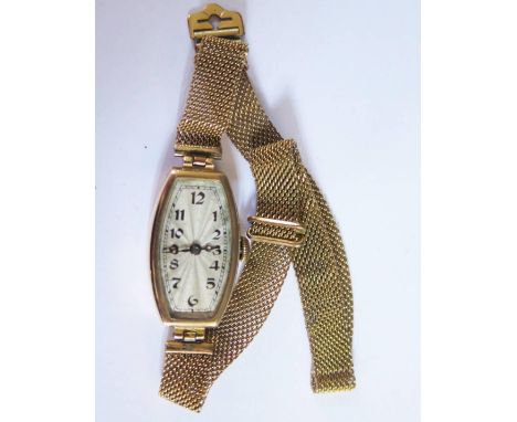 A 9ct Gold Ladies Watch with guilloché enamel dial and Swiss 15 jewel movement, running 