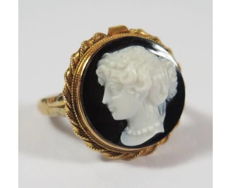 A Late Victorian 18ct Gold Hardstone Cameo Ring decorated with a bust of a lady, cameo 15mm diam., size M.5, 5.5g 