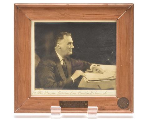 ROOSEVELT, Franklin Delano (1882-1945) President of the United States 1933-45. Signed photograph. Photograph of FDR seated at