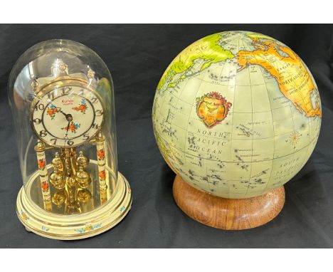 Kundo carriage clock and globe, approximate height of globe 24 inches 