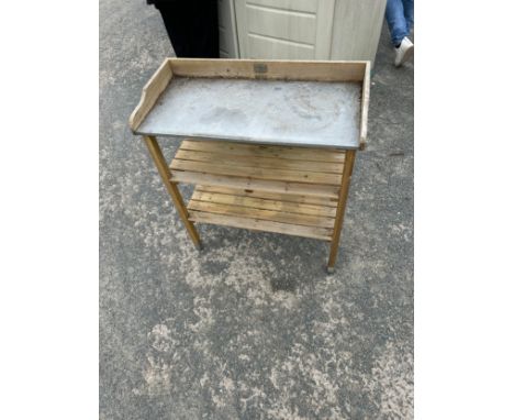 Garden potting bench neasures approx 35 inches tall, 15 deep 