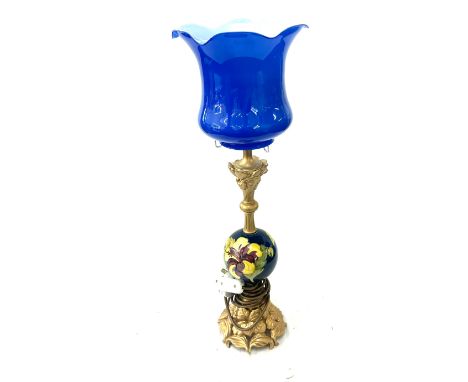 Moorcroft table lamp with a blue glass shade in working order overall height 24 inches tall 