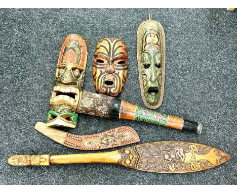 Selection of tribal souvenir wooden wall masks, aboriginal pieces 