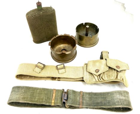 2 pieces of trench art, 2 webbing belts (one wih ammunition pouch), post war water bottle 