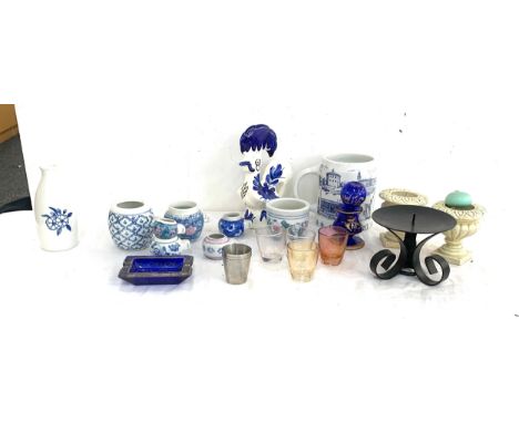 Selection of oriental pottery includes candle stick etc 