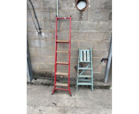 Two pair of step ladders one wooden one metal tallest measures 76 inches tall 