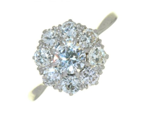 AN OLD CUT DIAMOND CLUSTER RING, OF FLORAL DESIGN, IN PLATINUM, MARKED PLATINUM, 3G, SIZE K++LIGHT WEAR CONSISTENT WITH AGE 