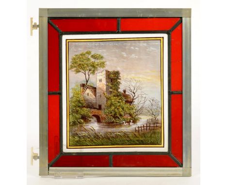 A VICTORIAN STAINED GLASS PANEL PAINTED WITH SWANS NEAR A WATER MILL, IN RUBY GLASS SURROUND, 29 X 26CM, C1890, IN LATER ALUM
