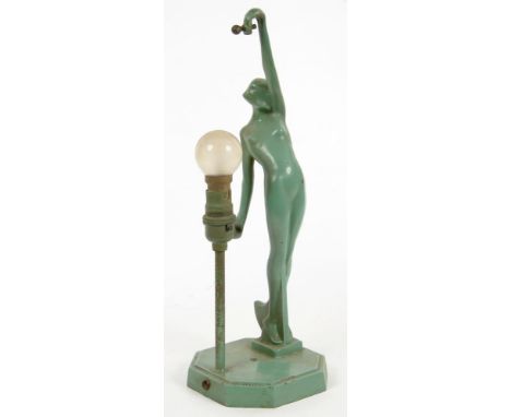 AN ART DECO GREEN PAINTED SPELTER TABLE LAMP IN THE FORM OF A NAKED YOUNG WOMAN ON TIPTOE, 38CM H, OCTAGONAL BASE INSCRIBED A