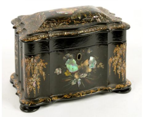 A VICTORIAN PAPIER MACHE TEA CADDY, INLAID IN MOTHER OF PEARL AND DECORATED WITH GILT FOLIAGE THE DIVIDED INTERIOR RETAINING 