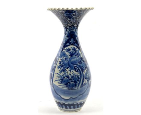 A JAPANESE BLUE AND WHITE IMARI VASE OF BALUSTER SHAPE WITH FRILLED RIM, 54CM H, EARLY 20TH C