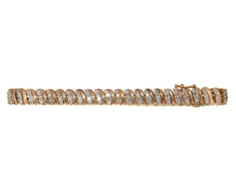 A DIAMOND BRACELET IN 9CT GOLD, 14G++LIGHT WEAR CONSISTENT WITH AGE 