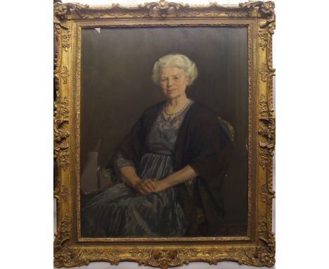 Patrick Edward Philips, British 1907-1976- "Portrait Mrs Johnson"; oil on canvas, signed and dated 1958, in a glazed gilt com