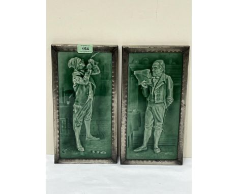 A pair of late 19th century metal framed Sherwin and Cotton Pickwick Papers ceramic tiles. 12¾" x 6¾".