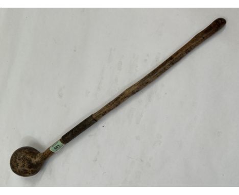 An Asian or African knobkerrie, the shaft with a series of notches. 24½" long.