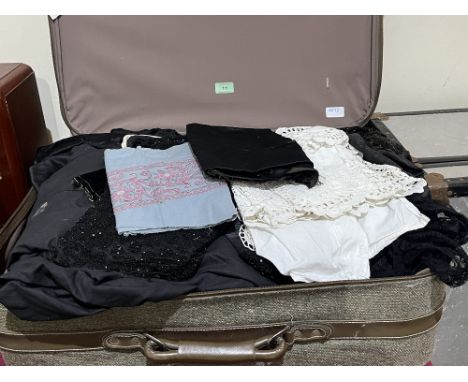 A case of vintage clothes