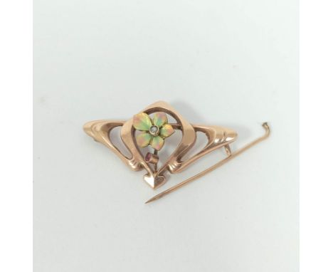 Continental Art Nouveau brooch of typical looped for M with enamelled pearl set flowerhead, indistinctly marked '333', 35mm l