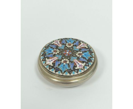 Faberge silver gilt and enamel circular box with angular sides and cover in blue, white pink and other hues, upon a matte gro