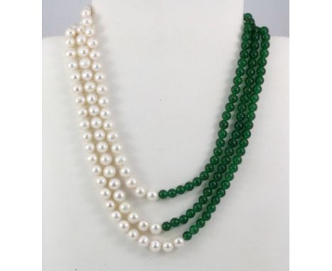 A three row pearl and jade bead necklace, L. 48cm.