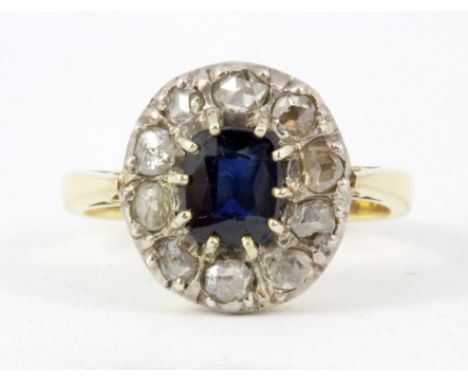 An 18ct yellow gold sapphire and diamond set cluster ring, (P.5).