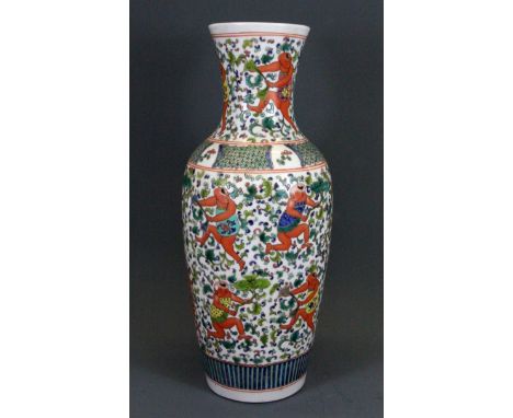 A 19th Century Chinese hand enamelled porcelain vase decorated with children playing with a lotus, H. 45cm.