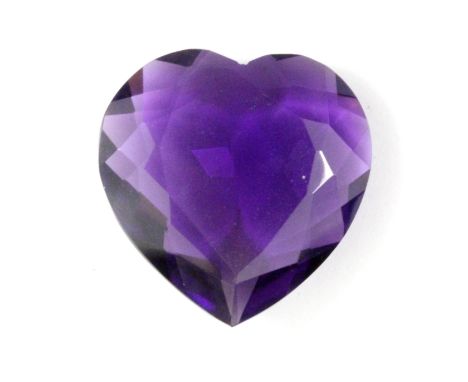 An unmounted 36.40ct heart shaped amethyst with certificate.