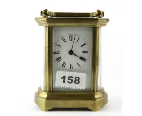 A brass carriage clock, H. 15cm.