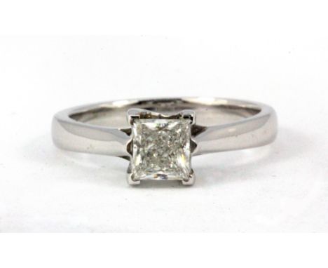 An 18ct white gold ring set with a 0.70ct princess cut solitaire diamond, approx. 4.2g, (N.5).