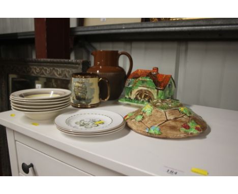 A tankard decorated with a sailing ship; a quantity of Grays pottery bowls; a cottage ware butter dish; three Susie Cooper pl