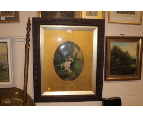 An early 20th Century painting on porcelain panel of a seated lady, signed Leslie Johnson
